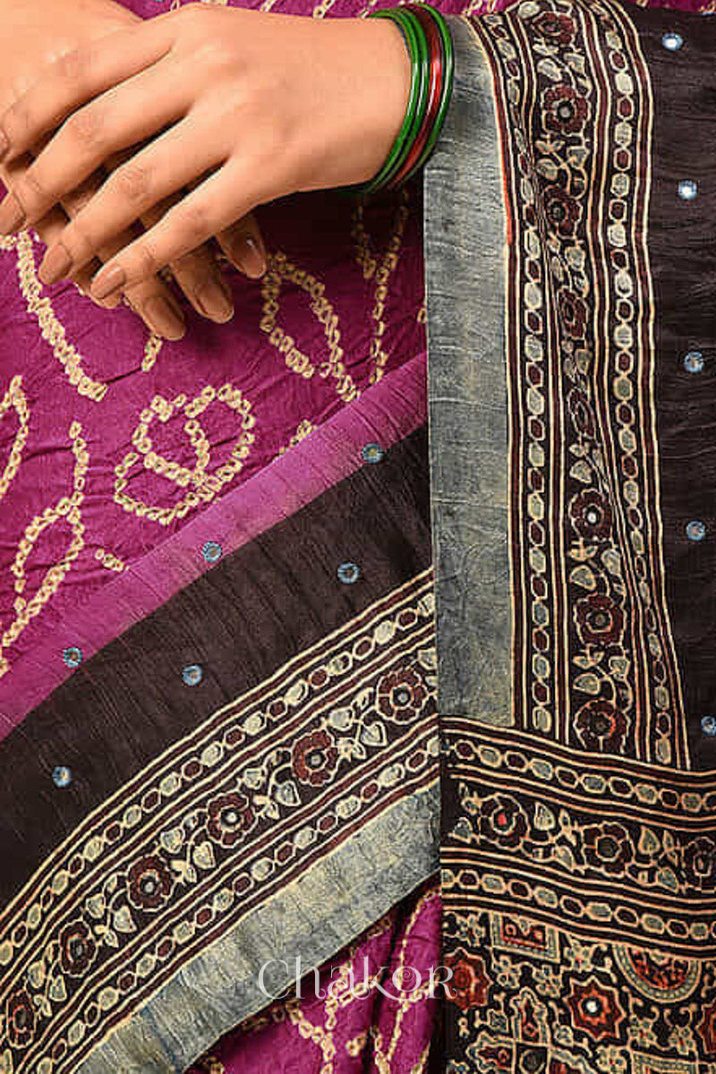 Chakor's traditional Magenta Black bandhani ajrakh pure silk saree with mirror embroidery.