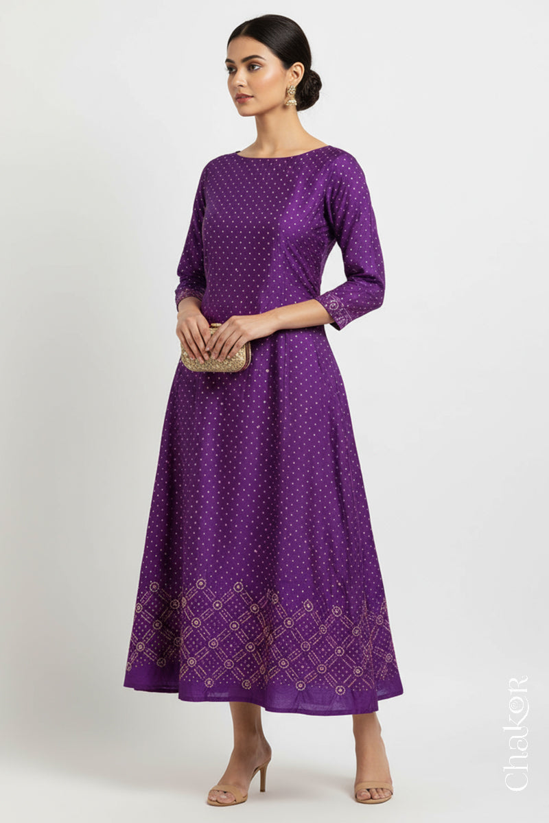 Purple mulberry silk Bandhani (Rai Bandhej) dress stitched from the fabric, featuring all-over white and mustard butis and a geometric mirror-work hem border – CHAKOR