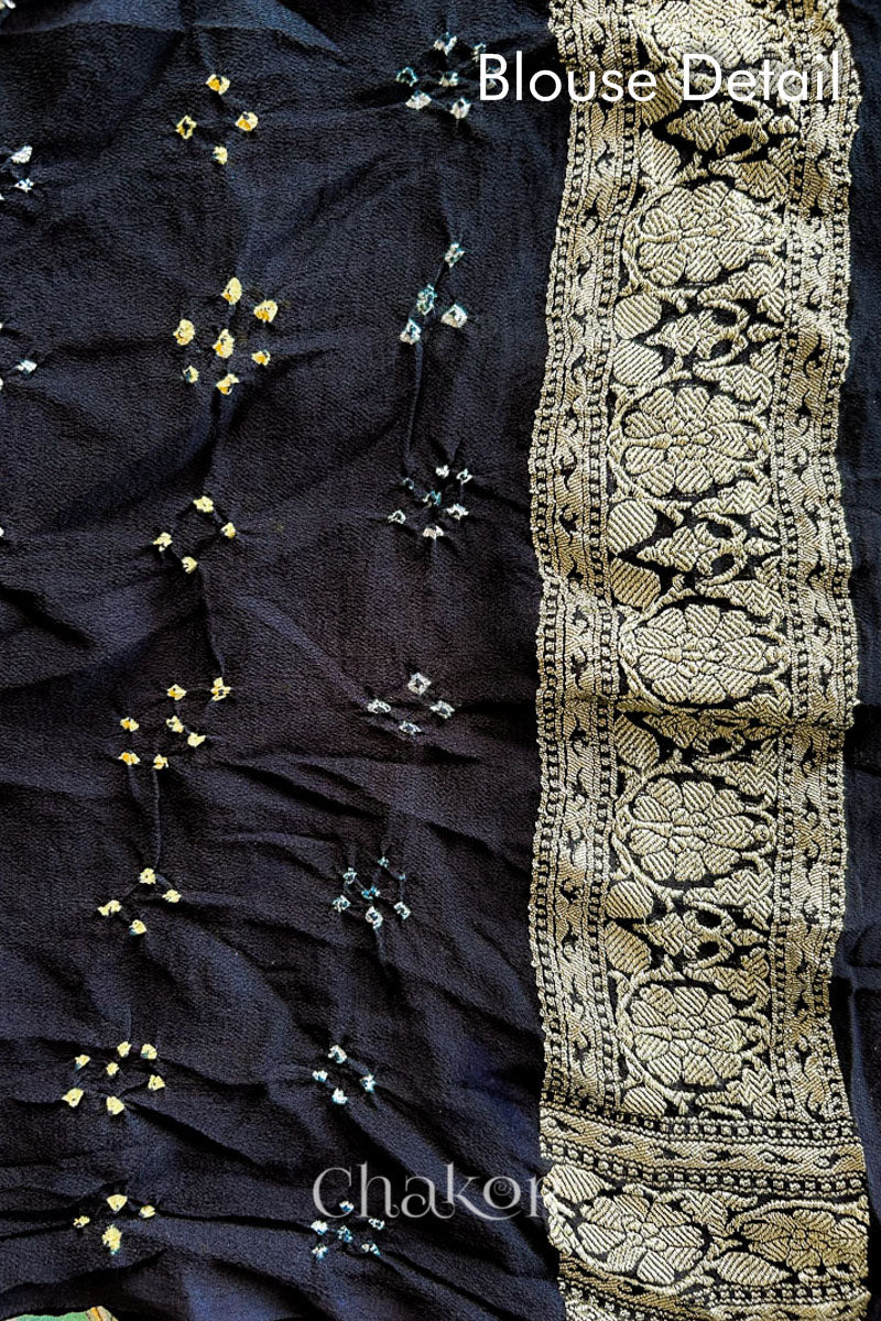 Close up of Handcrafted Black Bandhani Banarasi Georgette Saree in pure silk featuring zari weaving and Kutch Bandhej for weddings and occasions.