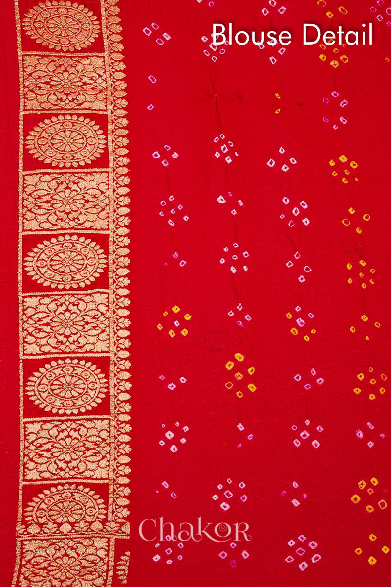 Close up of blouse of f Handcrafted Pink Red ombre shaded Bandhani Banarasi Georgette Saree in pure silk featuring zari weaving and Kutch Bandhej for weddings and occasions.