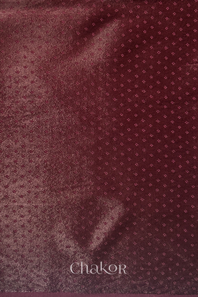 maroon mashru self textured fabric with 'Chakor' logo visible.