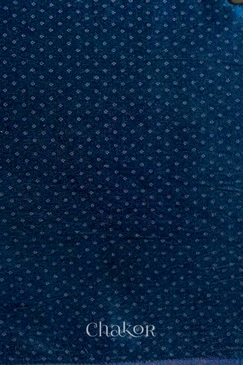Navy mashru self textured fabric with 'Chakor' logo visible.