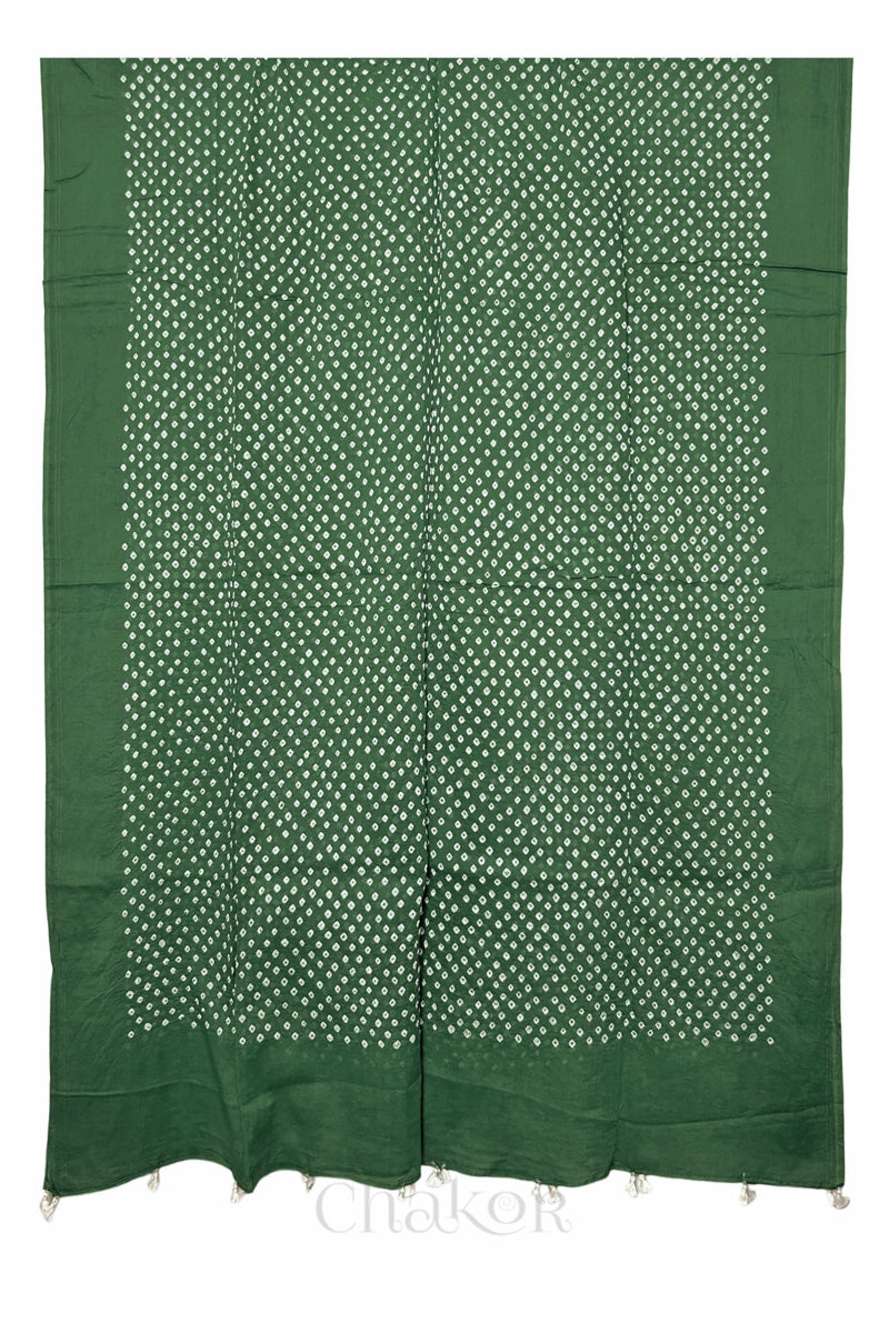 Full-length flat view of Moss green Bandhani mul cotton dupatta with all-over tie-dye pattern and tassels.