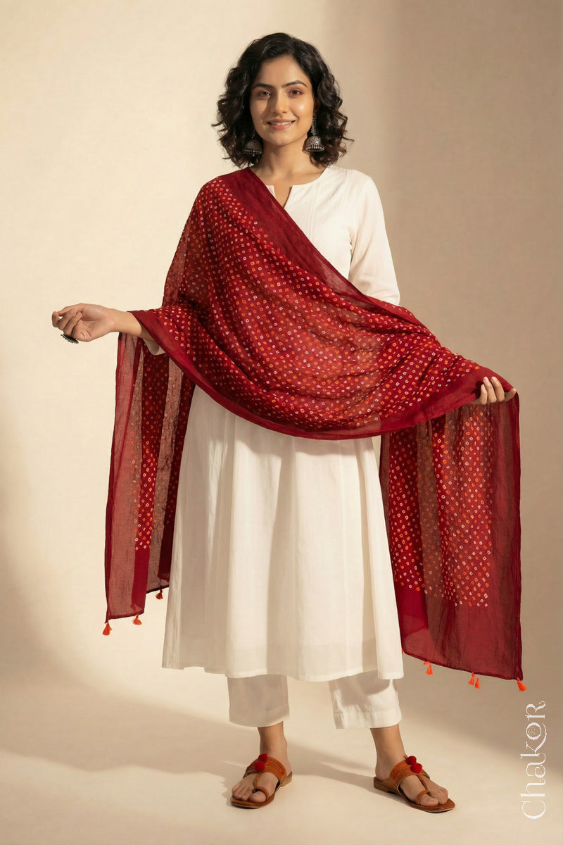 Red Mercerised Mulmul Bandhani Dupatta draped on model - Real Bandhej by CHAKOR