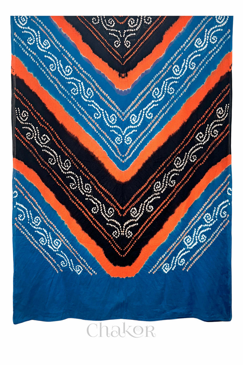 Flat front view of indigo and black Bandhani mul cotton dupatta showing chevron-style tie-dye band pattern.