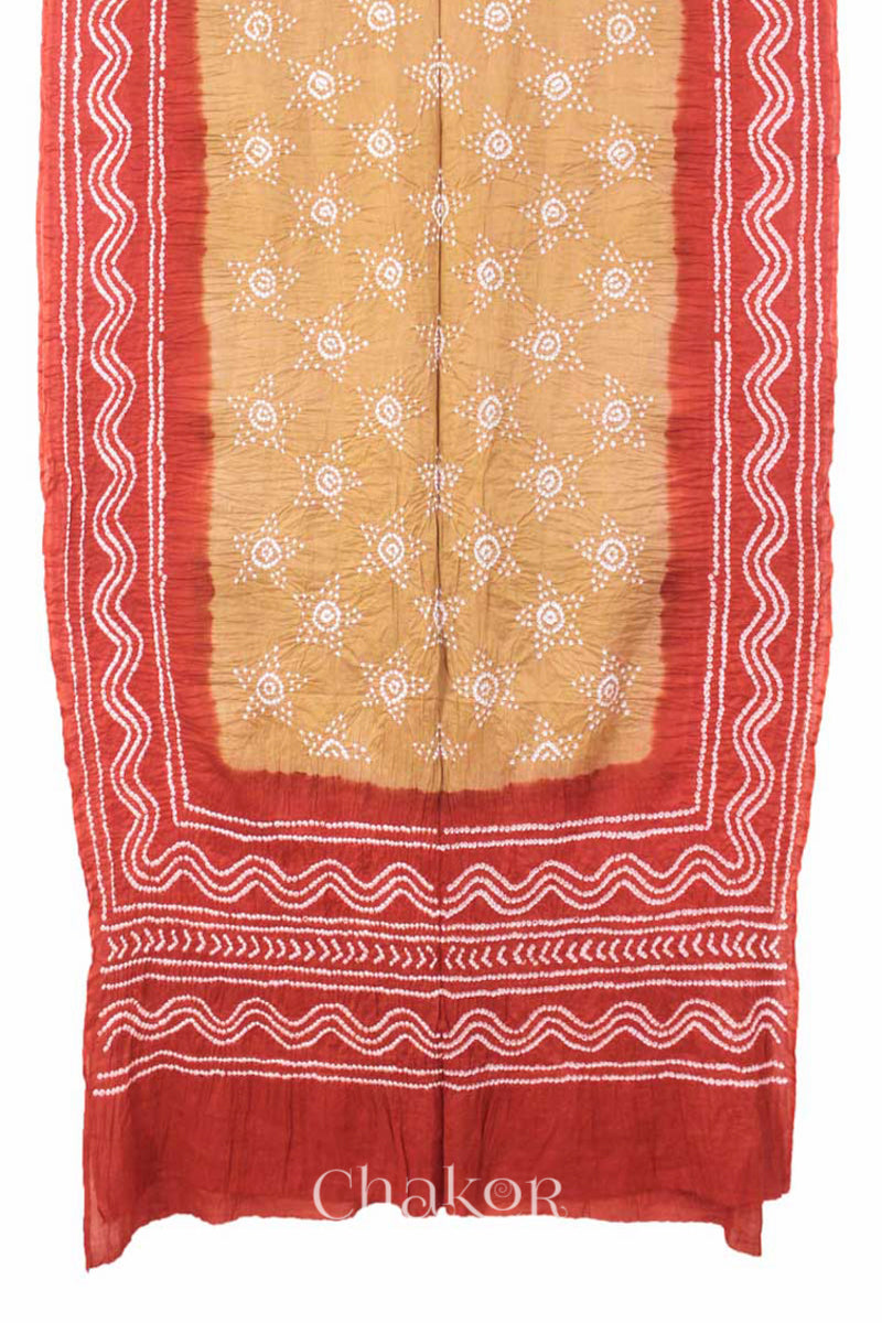 Handcrafted Beige Rust Bandhani Mul Cotton Saree by Chakor.