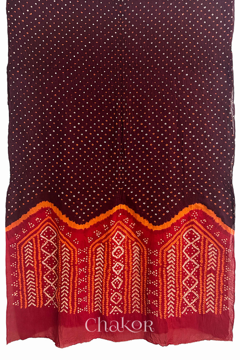 Full view of Maroon and Red Bandhani Mul Cotton Saree featuring multicoloured bandhej patterns.
