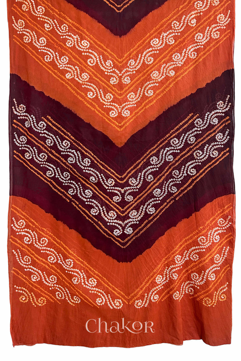 Full view of Maroon Rust Bandhani Mul Cotton Saree featuring multicoloured bandhani patterns.