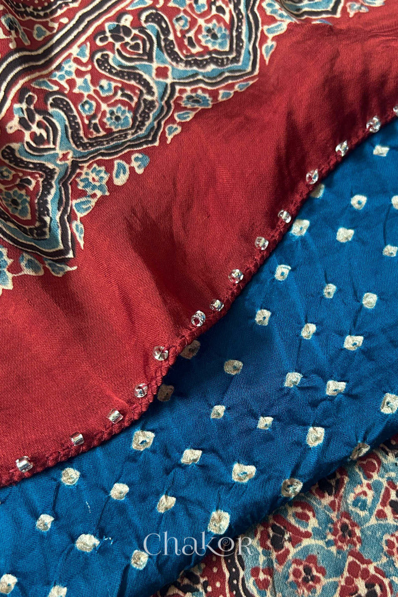 Blue Bandhani and Red Ajrakh combination modal stole with glass bead edging detail on pallu end.