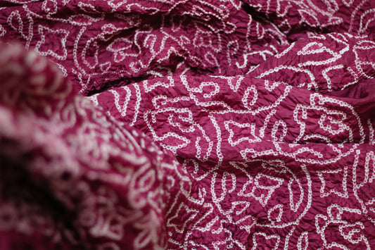 Intricate & traditional Bandhani patterns in mulberry silk on CHAKOR Pink saree.