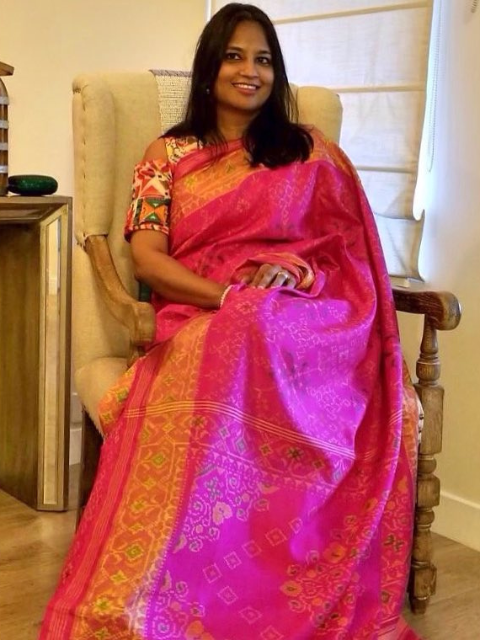 Shyamala wearing a pink Patola saree from CHAKOR.
