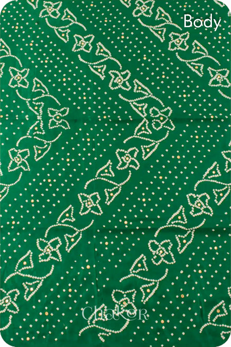 Chakor's traditional Green Bandhani Ajrakh saree with mirror embroidery 