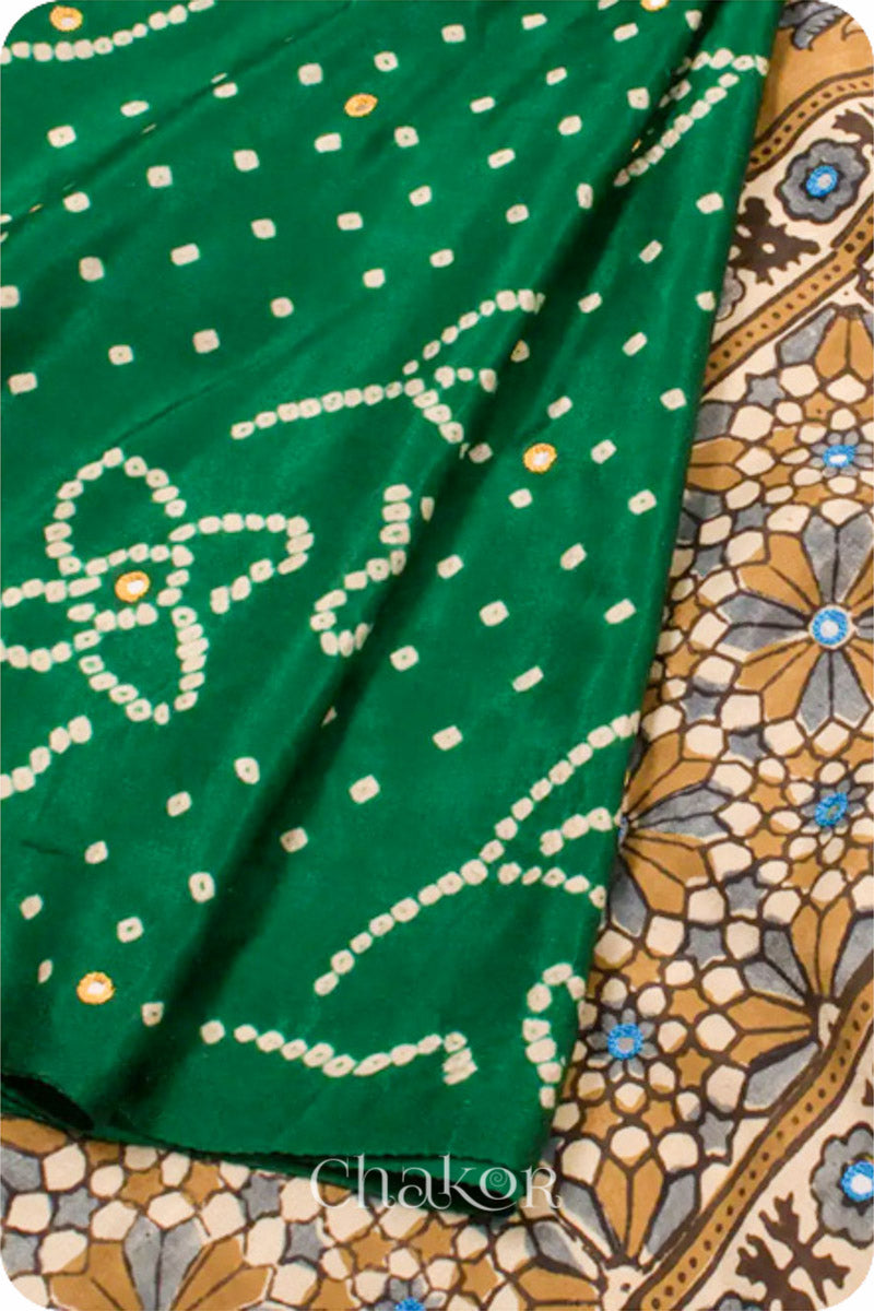 Chakor's traditional Green Bandhani Ajrakh saree with mirror embroidery 