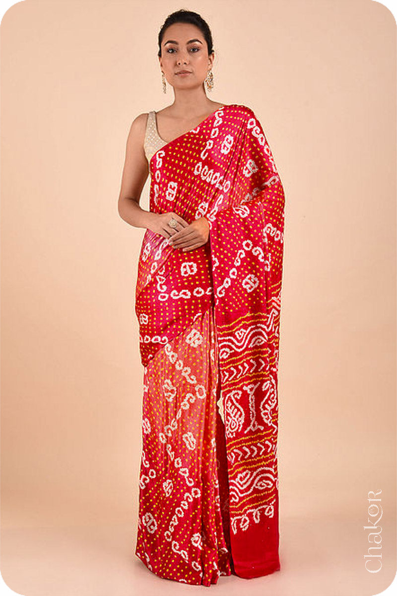 Chakor's traditional Red orange bandhani silk saree with mukaish embroidery