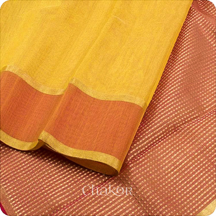 Chakor's Yellow Handlom Silk Cotton Saree with woven rust border and tissue pallu.