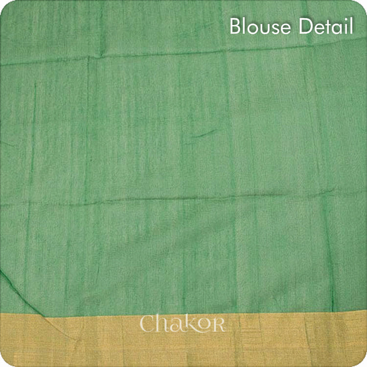 Chakor's Green Silk Cotton Saree with woven paisley buttis in zari.