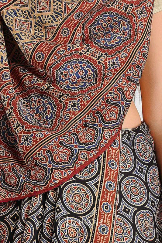 Woman Wearing Natural Dyed Madder Red Ajrakh Printed Modal Cotton Saree Handcrafted in Kutch.