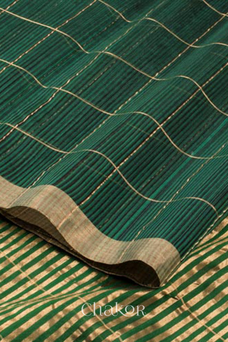 Border, body and pallu view of Chakor's Green Chanderi Silk Cotton Saree with woven tissue zari chex.
