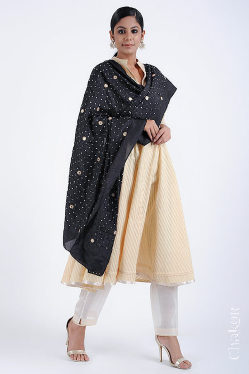 Full view model wearing Black Bandhani Mulberry silk dupatta with sequins embroidery and bead edging.