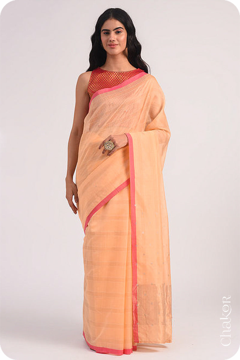 Chakor's Peach Handloom Silk Cotton Saree with woven fine zari stripes and embroidery.