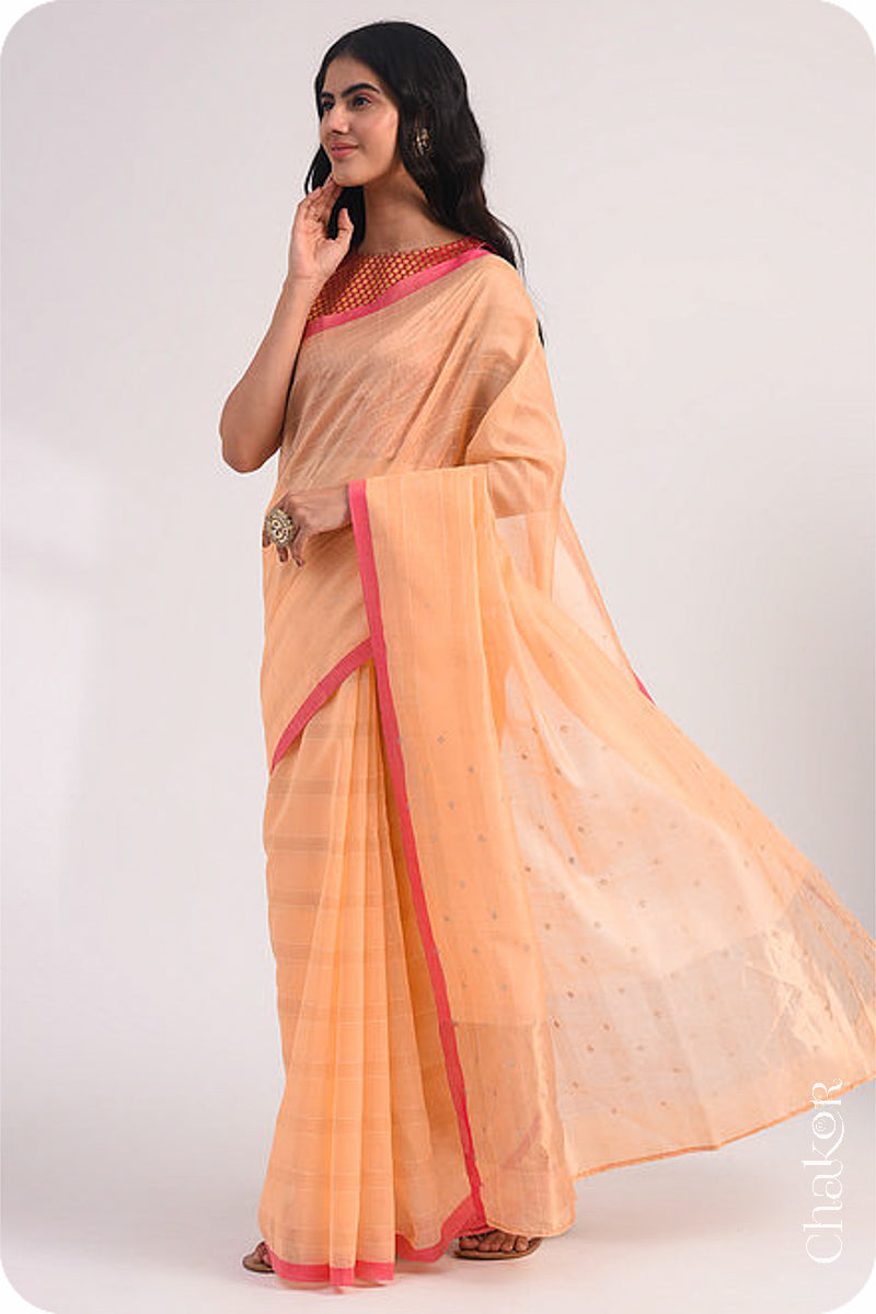 Chakor's Peach Handloom Silk Cotton Saree with woven fine zari stripes and embroidery.