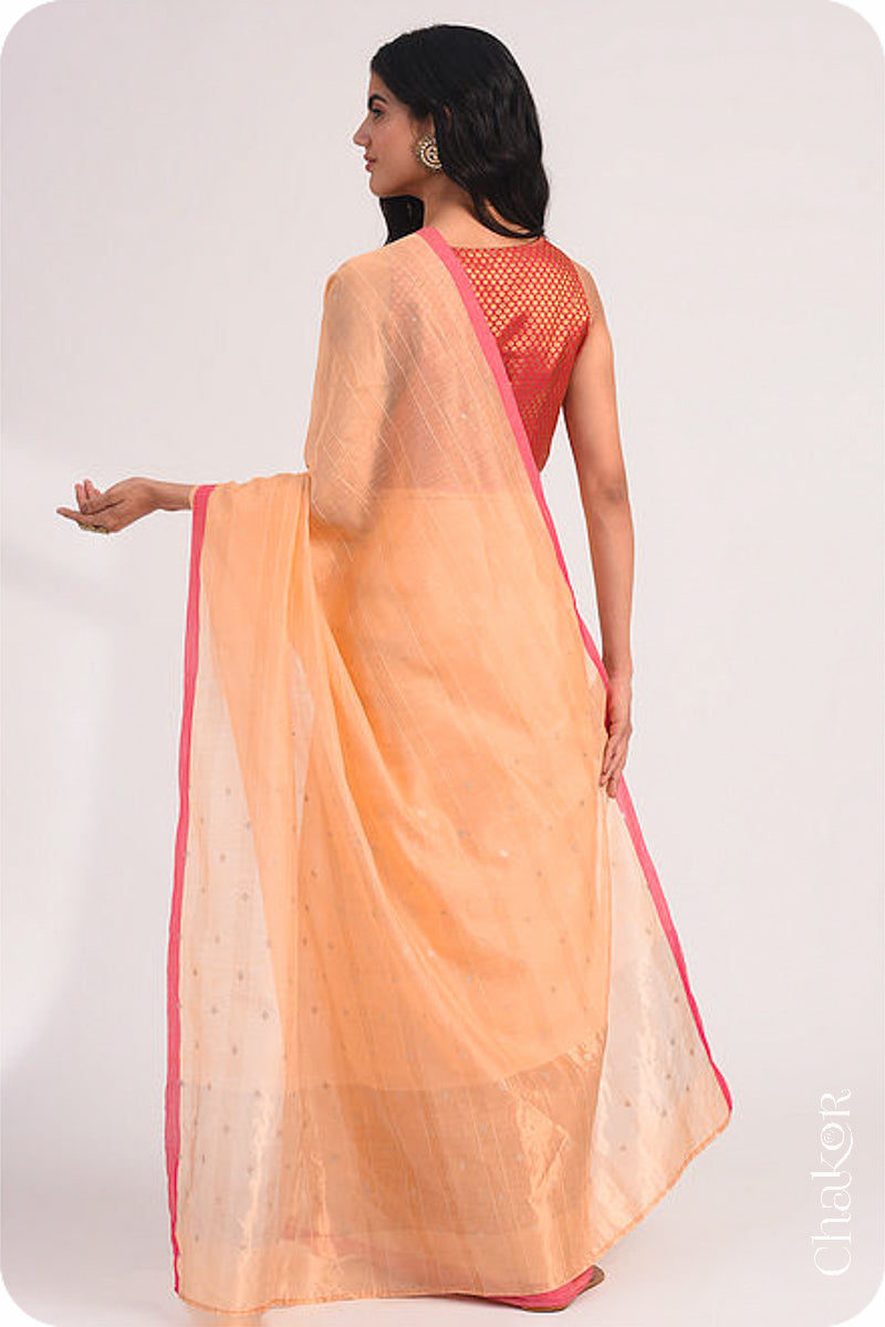 Chakor's Peach Handloom Silk Cotton Saree with woven fine zari stripes and embroidery.