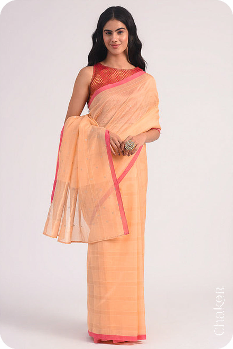 Chakor's Peach Handloom Silk Cotton Saree with woven fine zari stripes and embroidery.