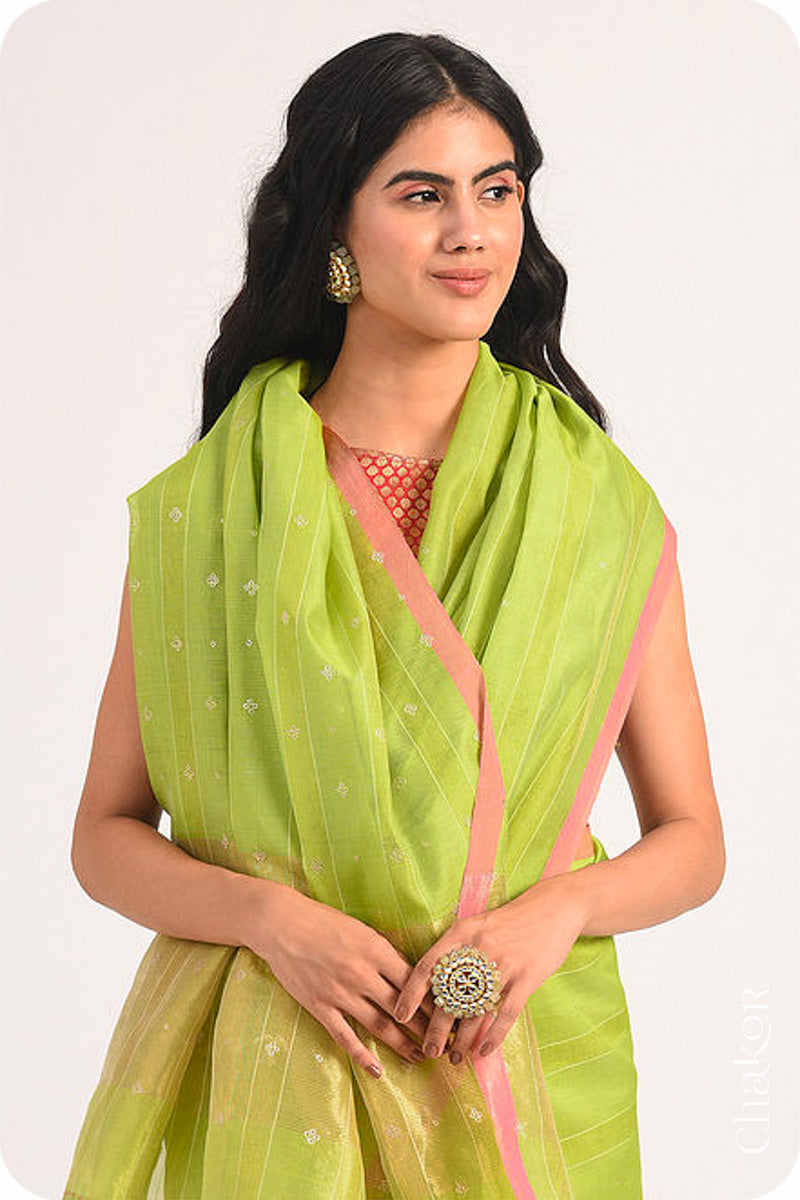 Chakor's Lime Green Handloom Silk Cotton Saree with woven fine zari stripes and embroidery.