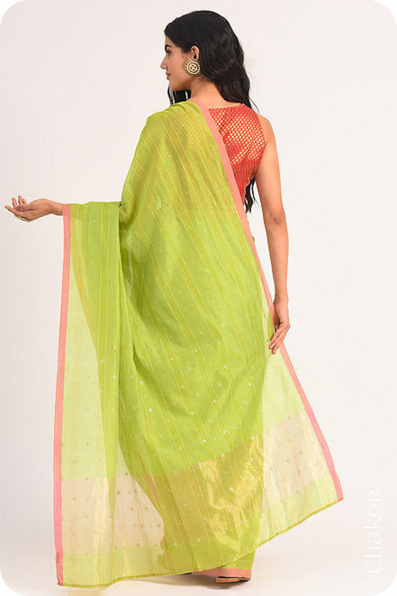 Chakor's Lime Green Handloom Silk Cotton Saree with woven fine zari stripes and embroidery.