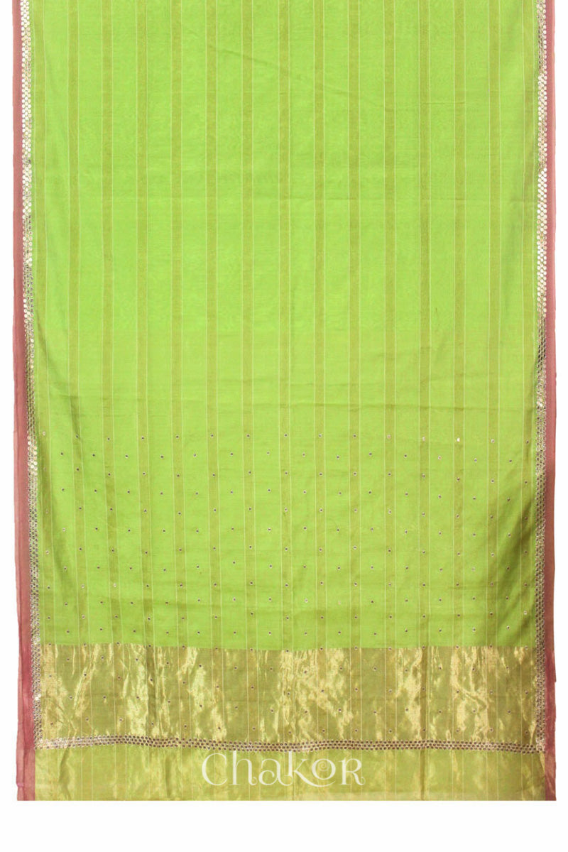 Chakor's Lime Green Handloom Silk Cotton Saree with woven fine zari stripes and embroidery.