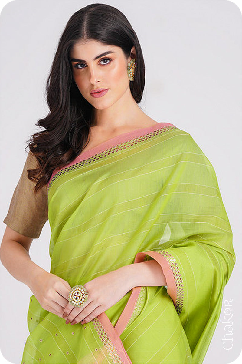 Chakor's Lime Green Handloom Silk Cotton Saree with woven fine zari stripes and embroidery.