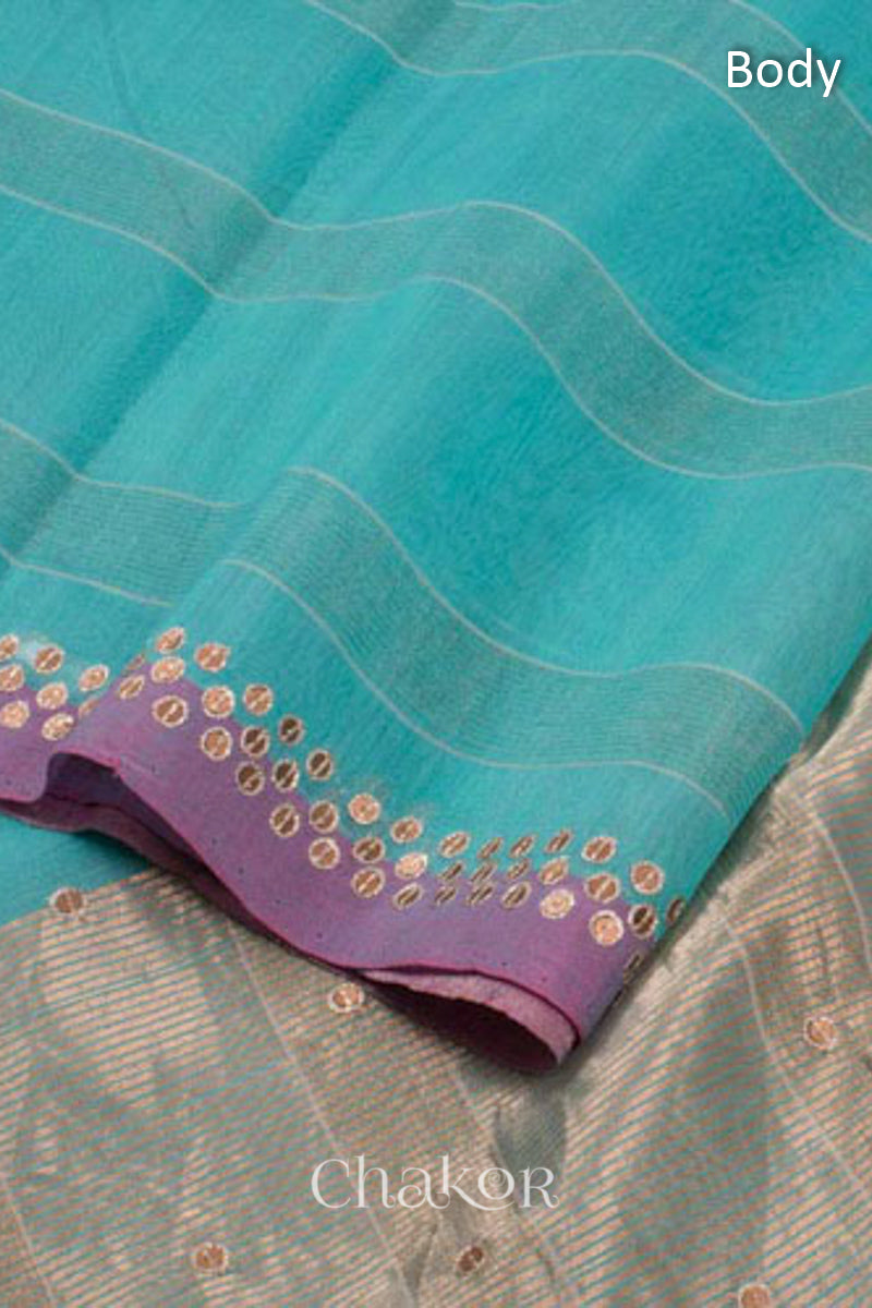 Detailed view of Turquoise Chanderi Silk Cotton Saree, featuring tissue pallu and sequins embroidery on border.