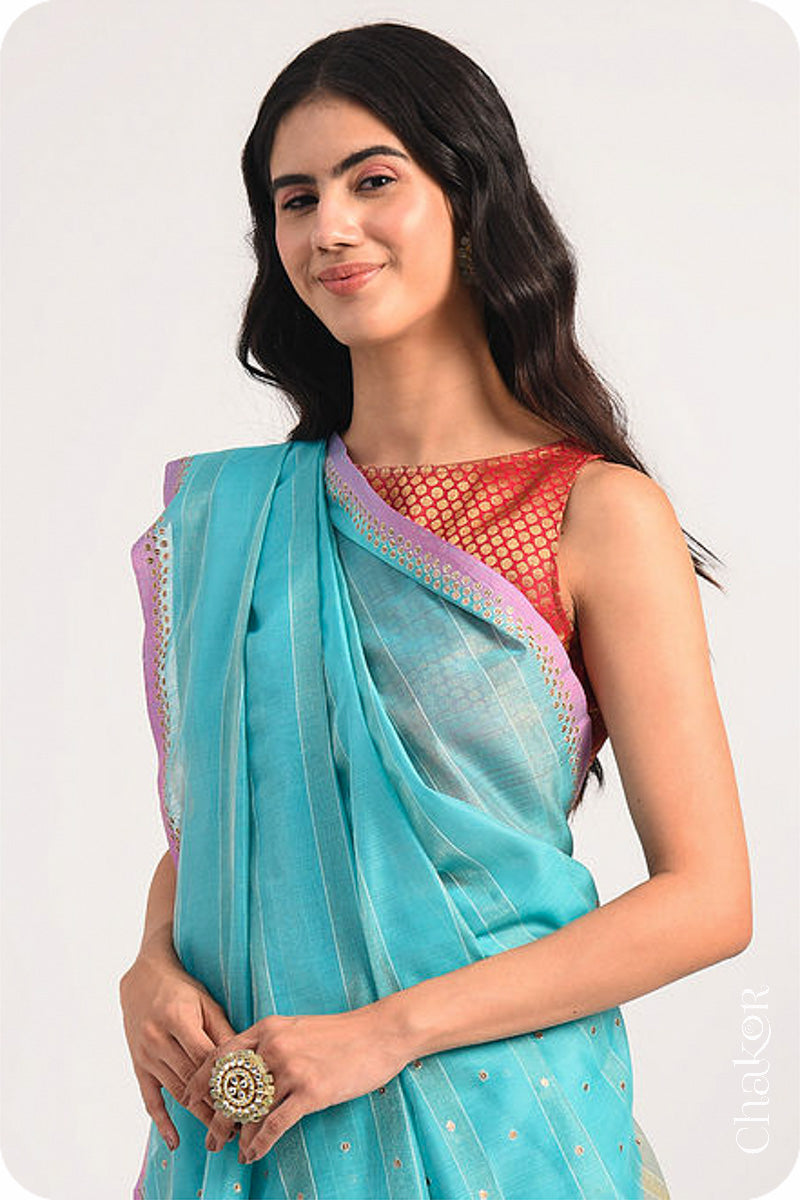 Chakor's Blue Handloom Silk Cotton Saree with woven fine zari stripes and embroidery.