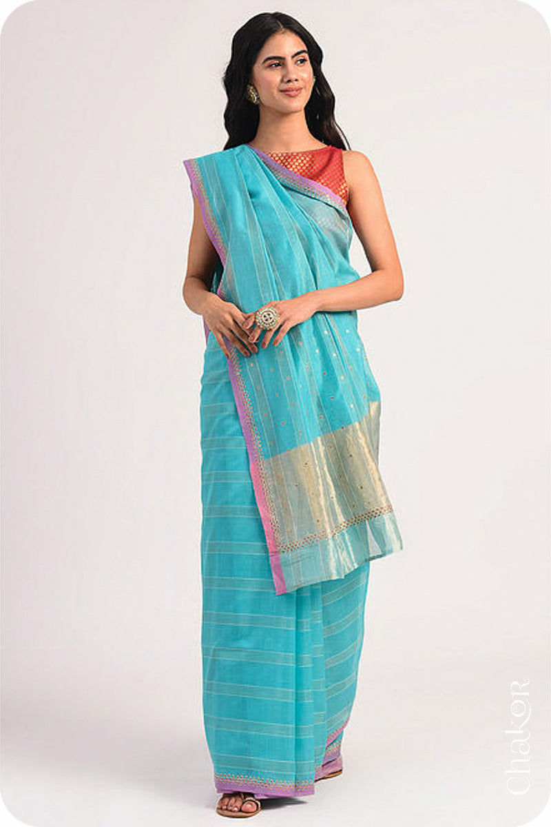 Chakor's Blue Handloom Silk Cotton Saree with woven fine zari stripes and embroidery.