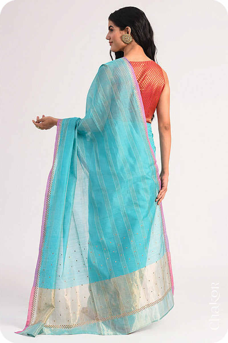 Chakor's Blue Handloom Silk Cotton Saree with woven fine zari stripes and embroidery.