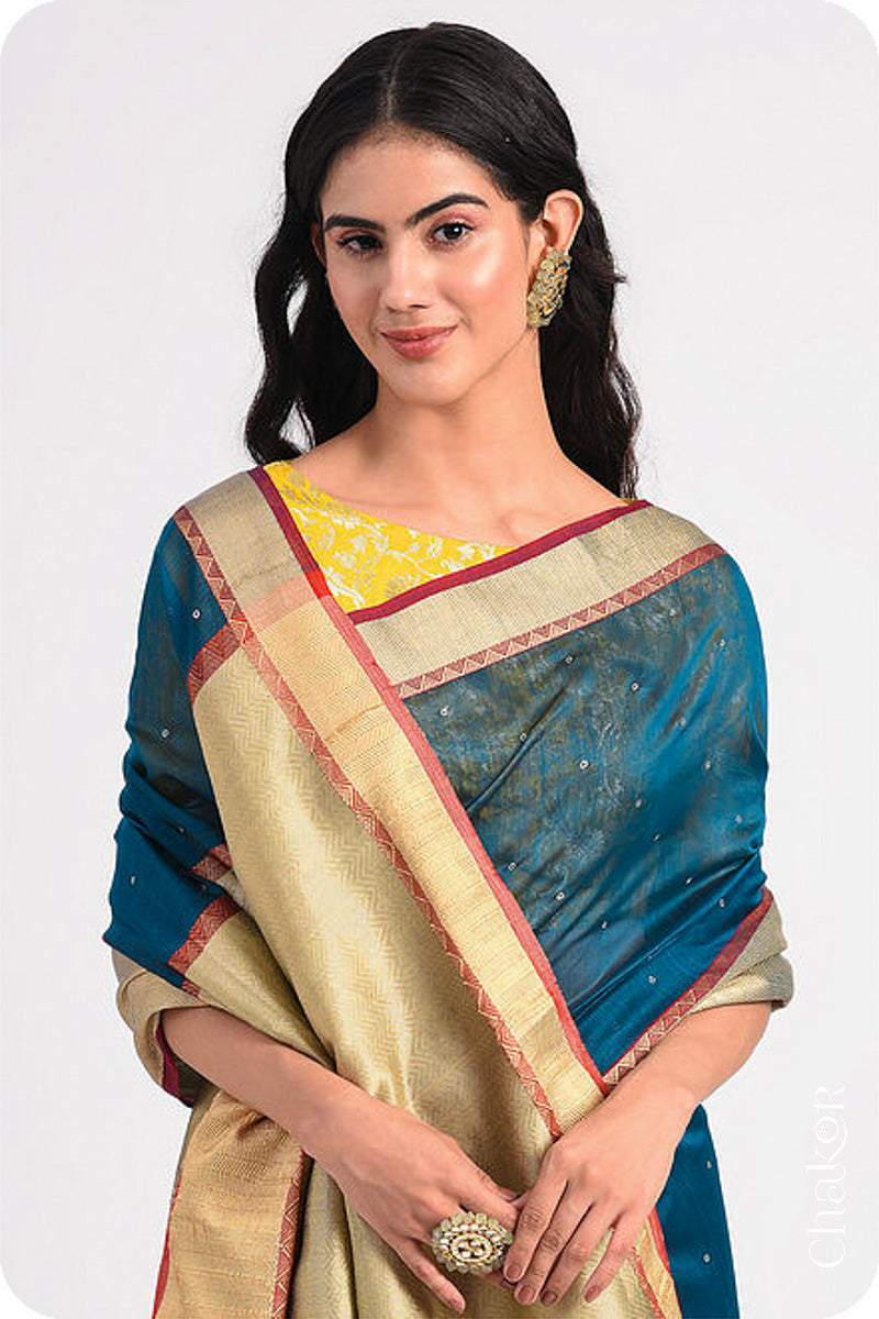 Chakor's Blue Handloom Silk Cotton Saree with woven textured zari border and embroidery.