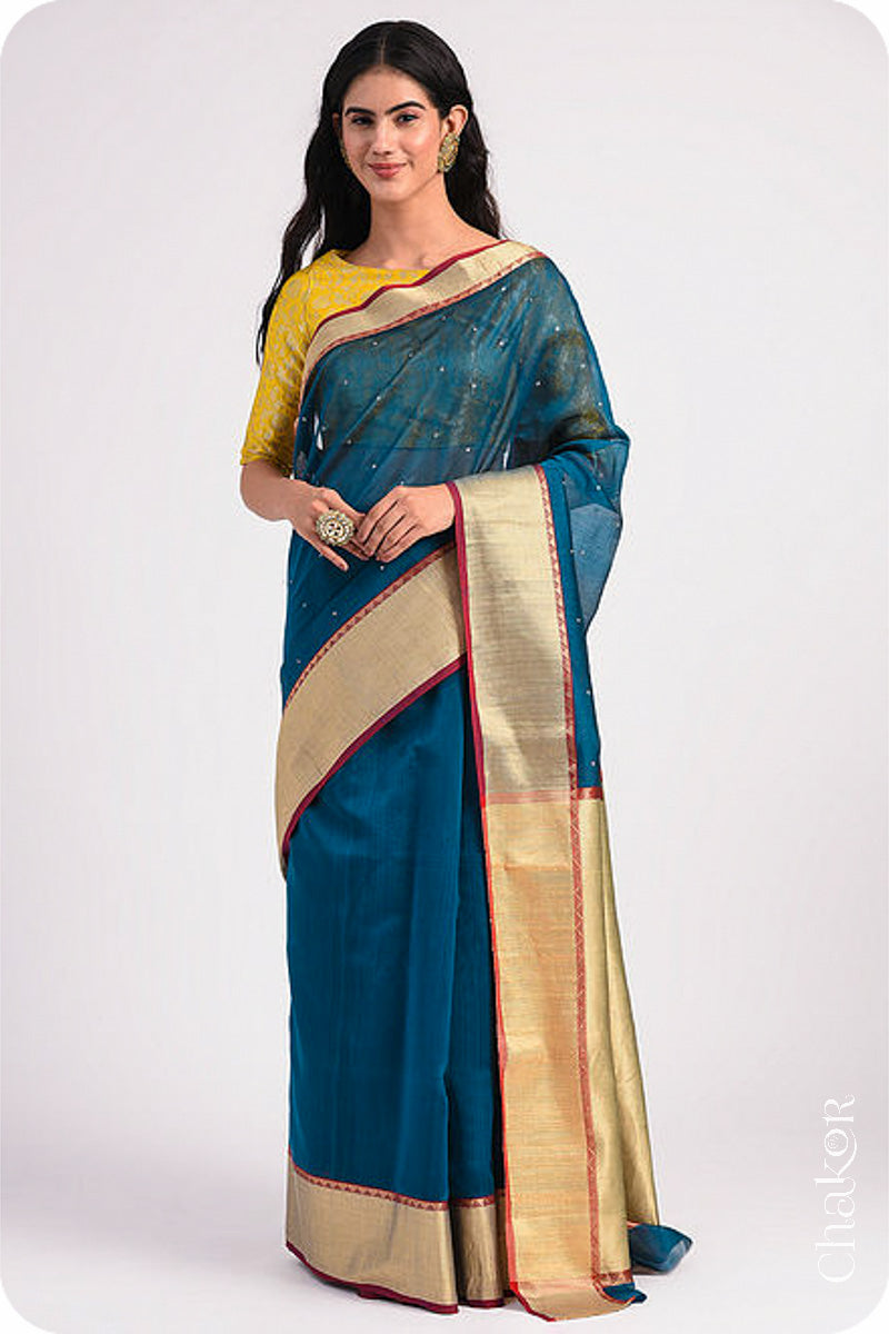 Chakor's Blue Handloom Silk Cotton Saree with woven textured zari border and embroidery.