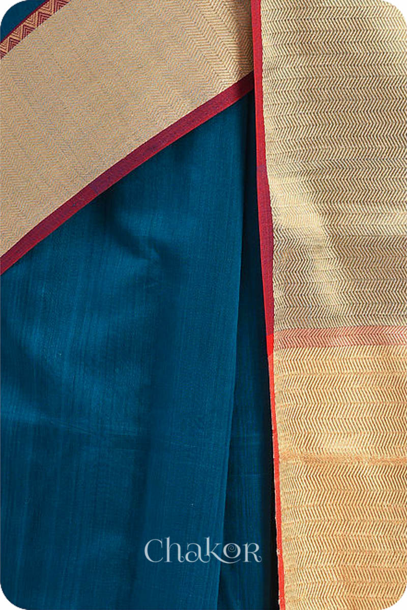 Chakor's Blue Handloom Silk Cotton Saree with woven textured zari border and embroidery.