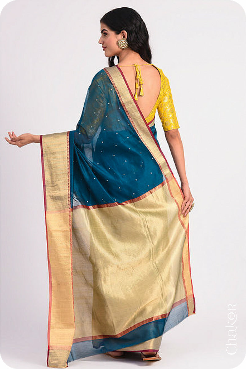 Chakor's Blue Handloom Silk Cotton Saree with woven textured zari border and embroidery.