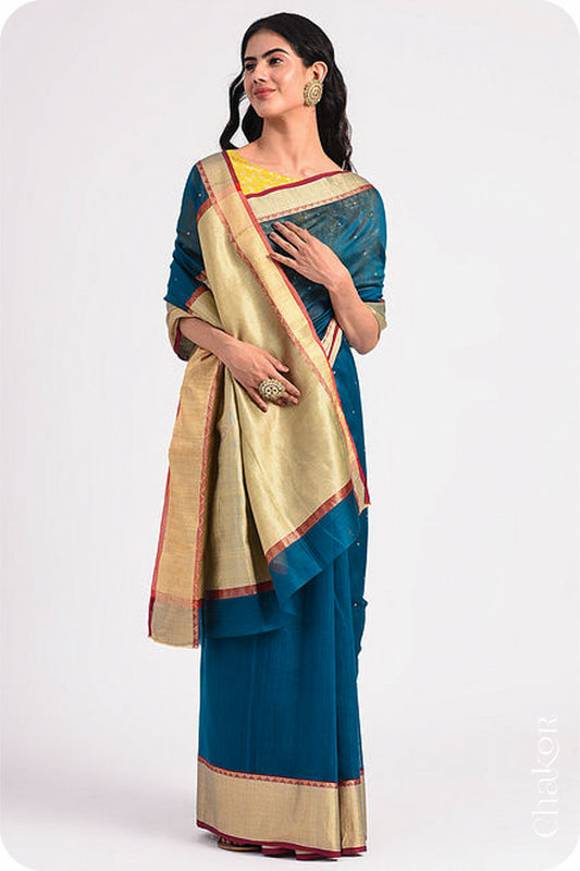 Chakor's Blue Handloom Silk Cotton Saree with woven textured zari border and embroidery.