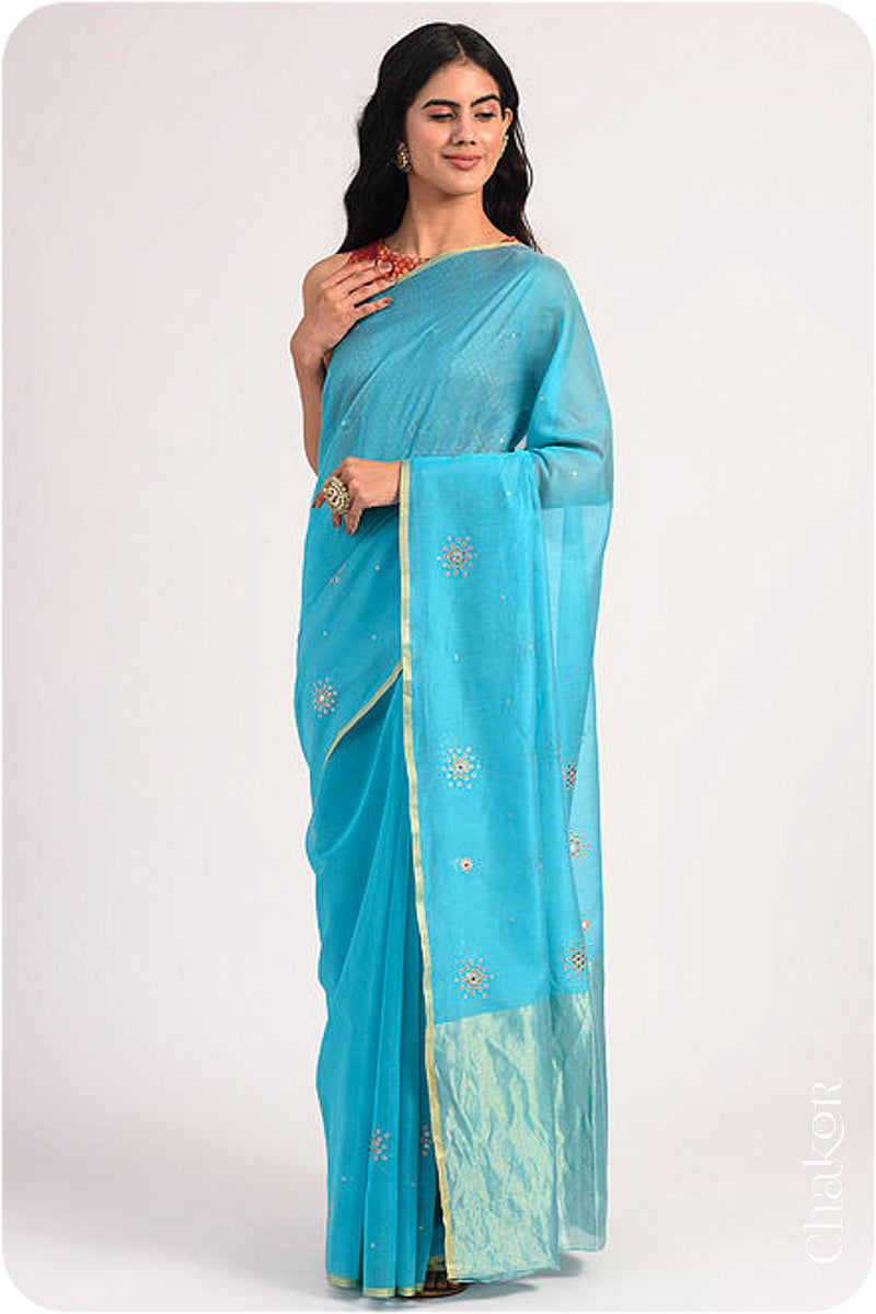 Chakor's Peacock Blue Handloom Silk Cotton Saree with woven tissue pallu & delicate sequin work buttis.