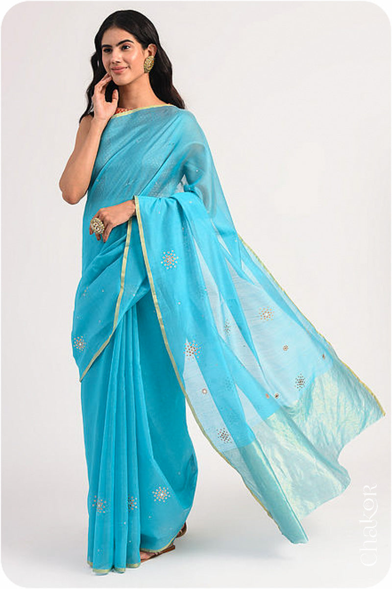 Chakor's Peacock Blue Handloom Silk Cotton Saree with woven tissue pallu & delicate sequin work buttis.