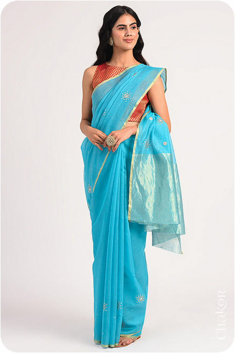 Chakor's Peacock Blue Handloom Silk Cotton Saree with woven tissue pallu & delicate sequin work buttis.