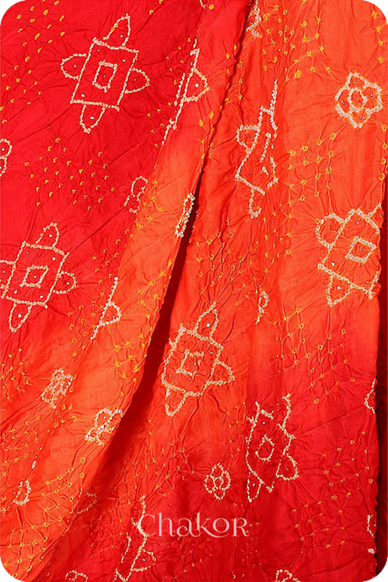 Chakor's traditional Orange Red bandhani pure silk saree with embroidery