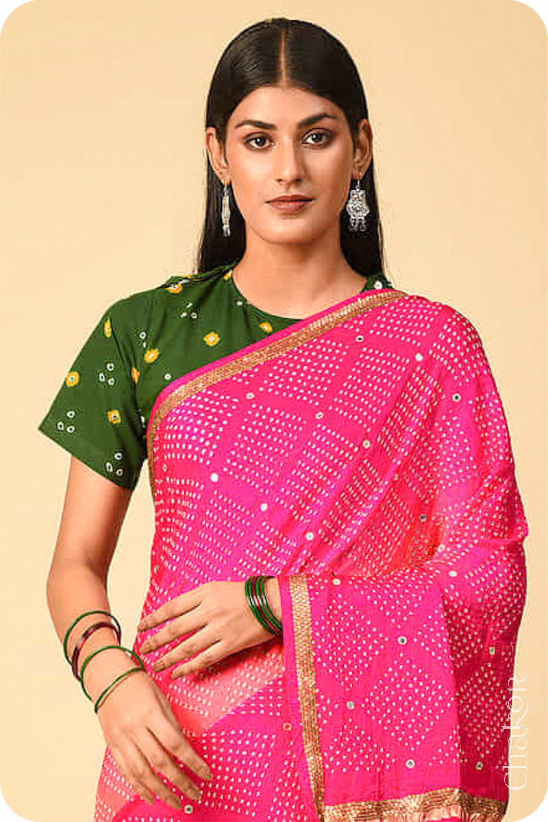 Chakor's traditional Peach Pink bandhani pure silk saree with sequins embroidery.