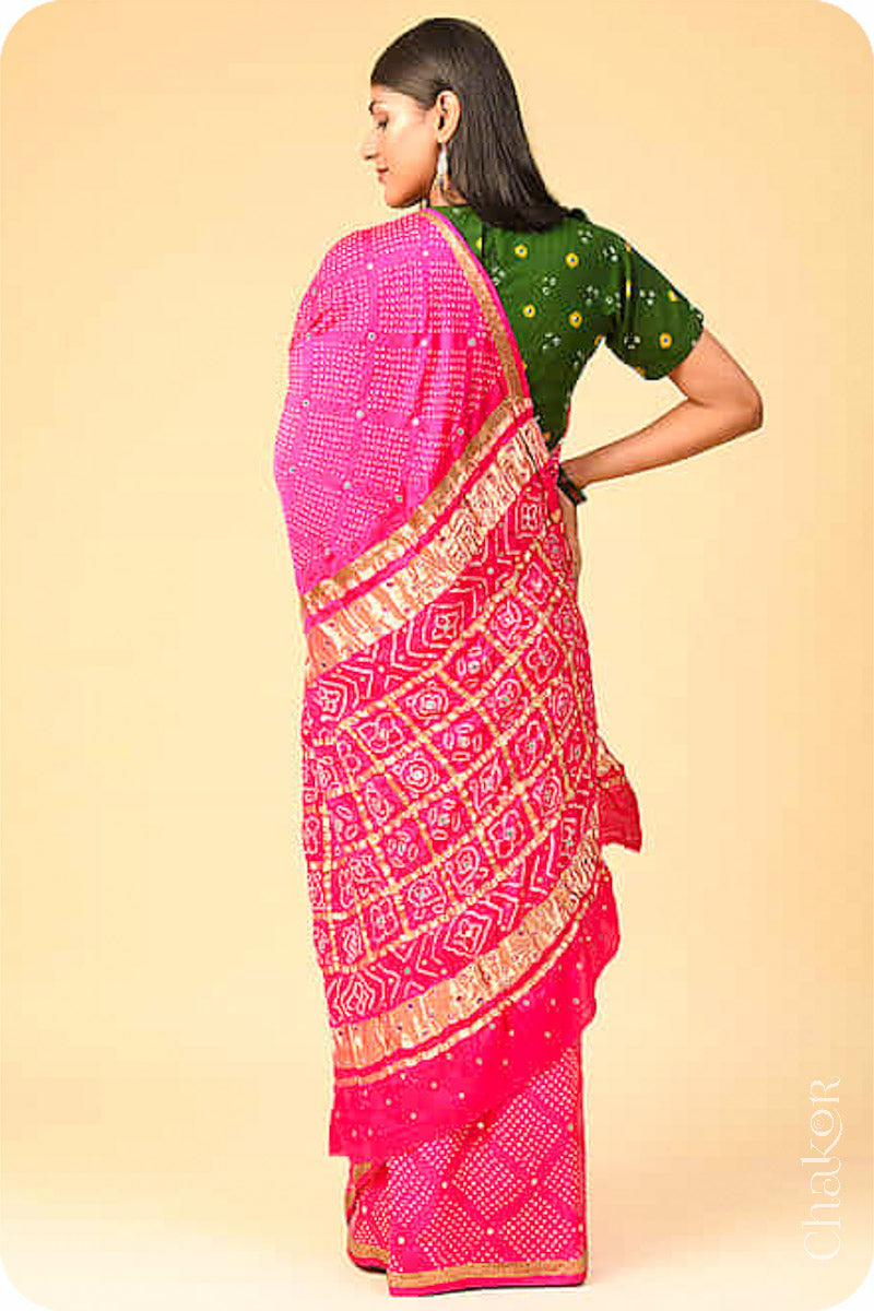 Chakor's traditional Peach Pink bandhani pure silk saree with sequins embroidery.