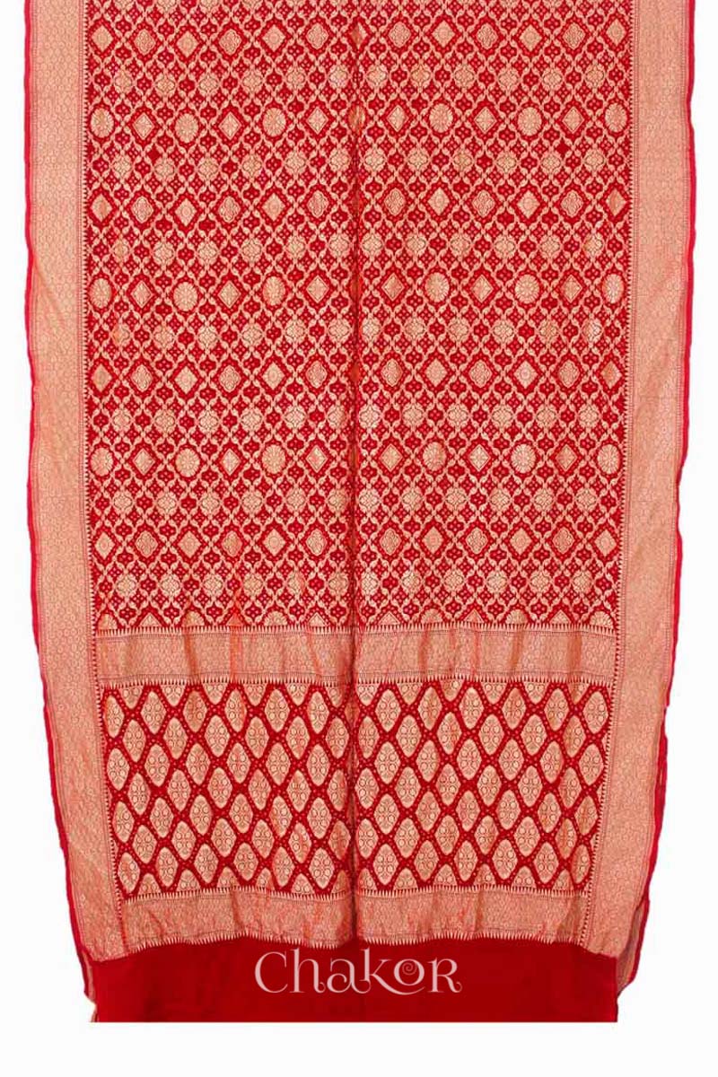 Chakor's traditional Red bandhej banarasi silk handloom saree.