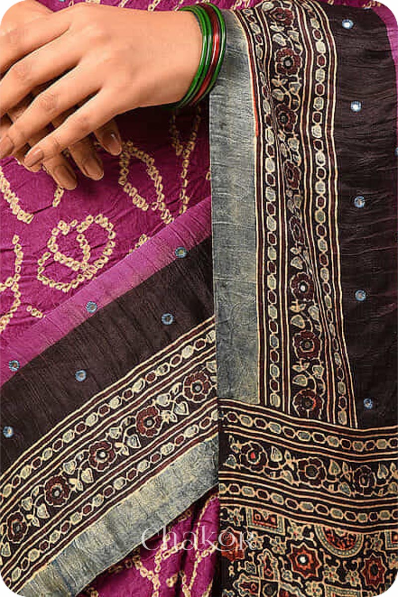 Chakor's traditional Magenta Black bandhani ajrakh pure silk saree with mirror embroidery.