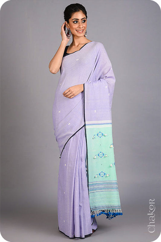 Handloom Mauve Bhujodi Cotton Saree by Chakor.Handloom Mauve Bhujodi Cotton Saree by Chakor.