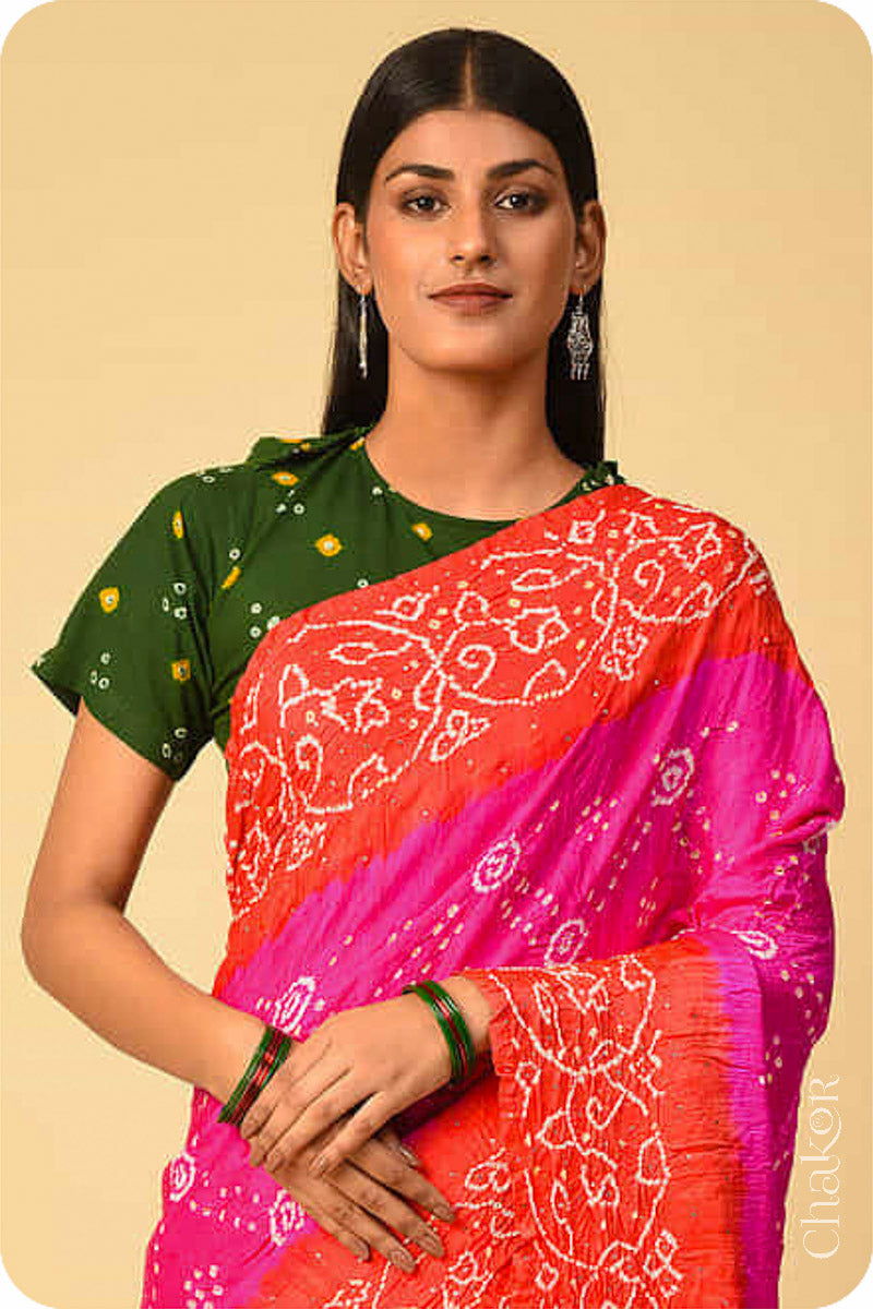 Chakor's traditional Pink Orange bandhani pure silk saree with mukaish embroidery.